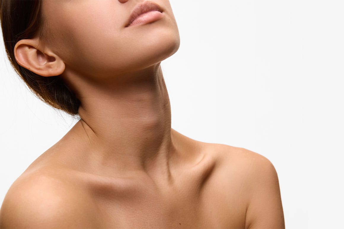 woman after her double chin reduction in Gulf Shores